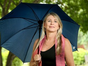 Margaret Konopacki poses for a photo in the downtown Ottawa park where her son, David Martin, used to love playing music.