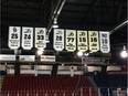 Banners honouring past members of the Hull and Gatineau Olympiques hockey team hang in the Robert Guertin Arena in Gatineau in this 2015 file photo.