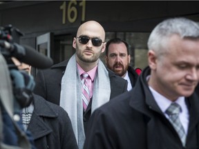 A 2019 file photo shows Ottawa police Const. Daniel Montsion leaving the courthouse during an adjournment early in his trial.