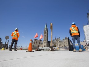 Construction workers on Parliament Hill