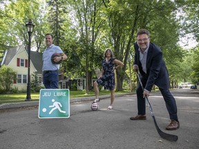 Gatineau Mayor Maxime Pedneaud-Jobin, right, promotes the city's special free-play streets program.