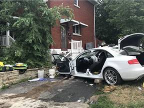 Firefighters had to extricate one person after a car collided with a house on Carling Avenue near Woodroffe.