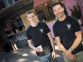 Jeremie Thompson and Andy Bassett at their new outdoor café, part of Little Victories, behind their brick and mortar shop on Bank Street.