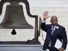 In this file photo taken on August 28, 2013 Rep. John Lewis speaks during the Let Freedom Ring Commemoration to commemorate the 50th anniversary of the March on Washington for Jobs and Freedom at the Lincoln Memorial.