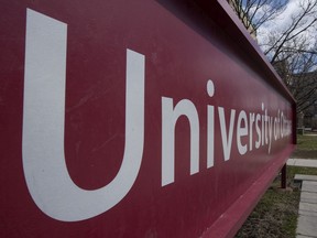 Files:  The University of Ottawa campus sign.  Canada's auditor general is calling for the federal government to step up its recovery of outstanding student loans to keep taxpayers from being left on the hook.