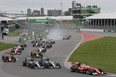 Formula One cars take the first turn at the start of the Canadian Grand Prix at Circuit Gilles-Villeneuve in Montreal on Sunday, June 12, 2016.