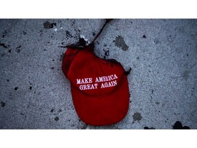 A tattered Make America Great Again (MAGA) hat lies on the ground during a protest near the site of a rally by U.S. President Donald Trump in Tulsa, Oklahoma, June 20.