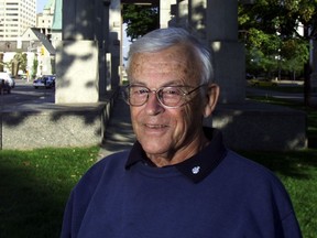 George Wilkes standing in front of the Human Rights Memorial on Elgin Street.