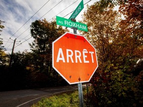 A street sign for Roxham Road near the U.S. and Canada border on Oct. 9, 2019.