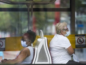 Masked riders on the TTC in Toronto: Get used to more face coverings everywhere.