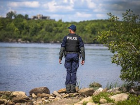 Ottawa police were on the water and combing the shore line to look for one of two fishermen who fell into the Ottawa River on Friday evening. The body of one man was found early Saturday.