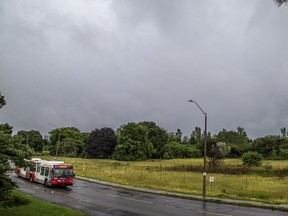 A lonely bus on a cloudy day.