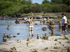Files: The hot weather has people out enjoying the sunshine along the Ottawa River at Remic Rapids.