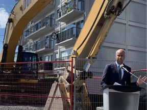 Minister Ahmed Hussen makes funding announcement on Preston Street Monday at site of 30-storey SoHo Italia.