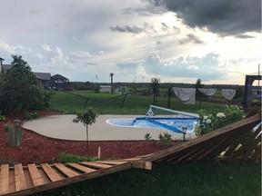 Emily Glossop took photos of the damage at the family's Dunrobin home from Monday night's powerful storm. Two years ago, the family's house was destroyed by the Dunrobin tornado.