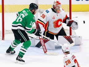 File photo/ Cam Talbot #39 of the Calgary Flames makes the third period save on Joe Pavelski #16 of the Dallas Stars in Game Five of the Western Conference First Round during the 2020 NHL Stanley Cup Playoffs at Rogers Place on August 18, 2020 in Edmonton, Alberta, Canada.