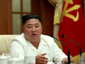 In this picture taken on August 25, 2020 and released from North Korea's official Korean Central News Agency (KCNA) on August 26, 2020 North Korean leader Kim Jong Un speaks during a meeting of the political bureau and the executive policy council of the 7th central committee of the Workers' Party of Korea (WPK) in Pyongyang.