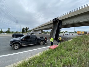 A dump truck box came off a truck by the 417 overpass near Canadian Tire Centre Thursday August 20, 2020. 
Tony Caldwell/Postmedia