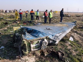 Files: Rescue teams at the crash site of a Ukrainian airliner that was mistakenly shot down by Iranian forces — shortly after take-off from Imam Khomeini airport in the Iranian capital Tehran on January 08, 2020.