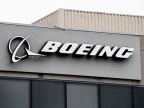 (FILES) In this file photo the Boeing Company logo is seen on a building