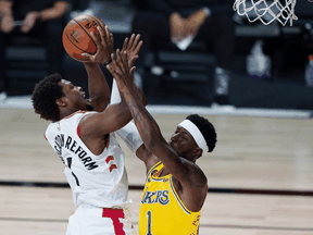 Kyle Lowry of the Toronto Raptors drives to the basket against Kentavious Caldwell-Pope of the Los Angeles Lakers on August 1, 2020.