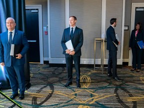 Conservative Party of Canada leadership candidates Erin O'Toole, left to right, Peter MacKay, Derek Sloan and Leslyn Lewis wait for the start of the French Leadership Debate in Toronto on Wednesday, June 17, 2020.