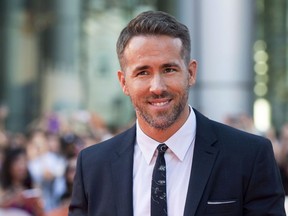 Ryan Reynolds poses on the red carpet during the 2015 Toronto International Film Festival in Toronto on Wednesday, September 16, 2015. Reynolds has responded to a plea from British Columbia Premier John Horgan for help with messaging to younger residents about partying during a pandemic.