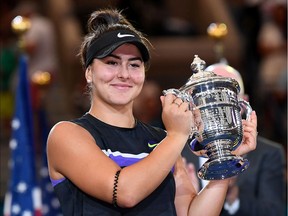 Bianca Andreescu of Canada with the US Open championship trophy after beating Serena Williams of the USA in the women's singles final on day thirteen of the 2019 U.S. Open tennis tournament at USTA Billie Jean King National Tennis Center.