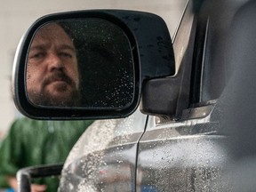 Objects in the mirror are angrier than they appear. Russell Crowe as Man in Unhinged.