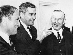 Two young cabinet ministers, Pierre Trudeau, left, and John Turner, centre, enjoy a jovial moment with then-prime minister Lester Pearson in 1967.