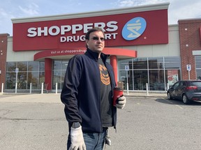 Stephen Mondoux stands outside the Shoppers Drug Mart on Walkley Road near Bank Street on Saturday.