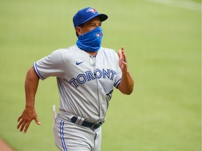 Files: Blue Jays manager Charlie Montoyo #25 heads to home plate prior to a game against the Atlanta Braves at Truist Park on August 5, 2020 in Atlanta, Georgia.