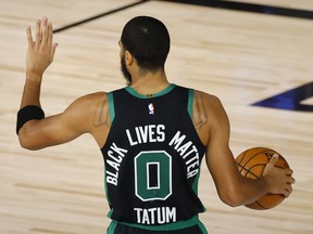 Black Lives Matter is shown on the jersey of Jayson Tatum #0 of the Boston Celtics in Game One of the Eastern Conference Second Round against the Toronto Raptors during the 2020 NBA Playoffs Aug. 30 in Lake Buena Vista, Florida.