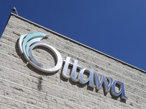 A file photo of a CIty of Ottawa sign at city hall.