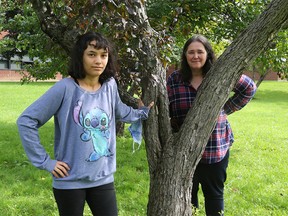 Millie (L) is going into Grade 8 at D. Roy Kennedy School. Her mother, Catharine Nedd, is concerned about the size of her daughter's Grade 8 class which is above the provincially-regulated average.