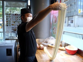OTTAWA- September 21, 2020 --  Chef Wang prepares noodles at 98Lala Noodles in Ottawa, September 21, 2020.