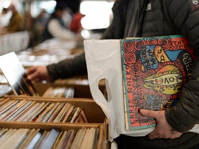 Music fans look for vinyl finds during the Dead Vinyl Society's Super Mega Records Garage Sale 6 at Kenilworth Community League in Edmonton, on Friday, April 19, 2019.