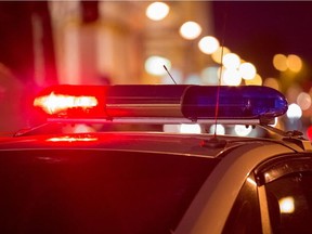 Red light flasher atop of a police car.