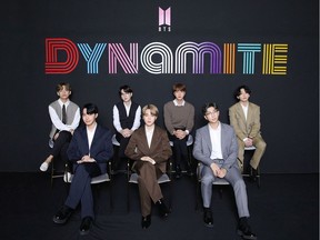 This handout photo taken in Seoul on September 2, 2020 and provided by Big Hit Entertainment shows K-pop group BTS members as they hold an online global media day. -