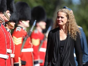 Newly sworn in Governor General Julie Payette inspects the honour guard at Rideau hall on Oct. 2, 2017. Former astronaut Julie Payette was installed Monday as Canada's 29th governor general. At 53, she is the fourth woman and third-youngest Canadian to take on the role of vice regal and commander in chief, replacing 76-year-old academic David Johnston.