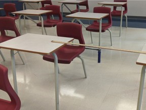 Teacher Bella Lewkowicz instructs Grades 7 and 8 students at a west-end Ottawa Catholic school. There are 24 students in her classroom, which is the provincial average class size for that grade. That allows the desks to be spaced so students are one metre apart from each other while seated.