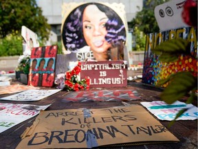 FILE PHOTO: Signs used during protests and rallies are gathered around a memorial for Breonna Taylor in Louisville, Kentucky, U.S., September 10, 2020.