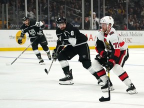 Ottawa Senators center Chris Tierney handles the puck against Los Angeles Kings defenceman Drew Doughty in the third period at Staples Center on March 11, 2020. The Kings won 3-2.