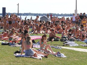 FILE: Hundreds of young people gather at Gord Downie Pier on the Kingston waterfront on Monday August 31, 2020.