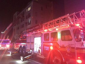 Ottawa Fire Services crews battle a fire in an apartment at 1014 Bank St. in the Glebe on Tuesday, Sept. 15, 2020. The fire was under control. Firefighters are ensuring the building is evacuated. Bank Street Southbound was closed.