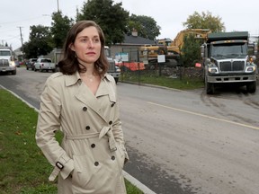 OTTAWA - Marjolaine Provost of the Overbrook Community Association poses for a photo at 261-265 Columbus Ave. in Ottawa Thursday Sept 10, 2020. With council set to consider new rules that could open the door to more low-rise apartments in established Ottawa communities, like Overbrook, Provost is concerned about overbuilding and not seeing complementary community infrastructure, like sidewalks and recreation spaces.