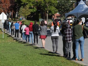 People lining up at the COVID-19 testing facility at Brewer Arena in Ottawa Wednesday Sept 23, 2020.