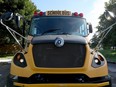 A school bus sits near École Horizon-Jeunesse in Ottawa on Thursday.