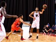 Thomas Scrubb of the Ottawa BlackJacks passes the ball past Malcolm Duvivier of the Fraser Valley Bandits during a Canadian Elite Basketball League Summer Series game at St. Catharines on July 30. Ottawa won 78-76.