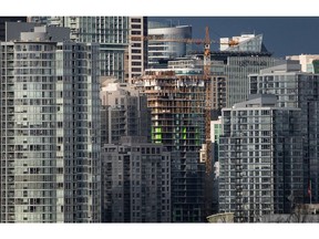 A condo tower under construction is pictured in downtown Vancouver earlier this year. Let's not become Vancouver.